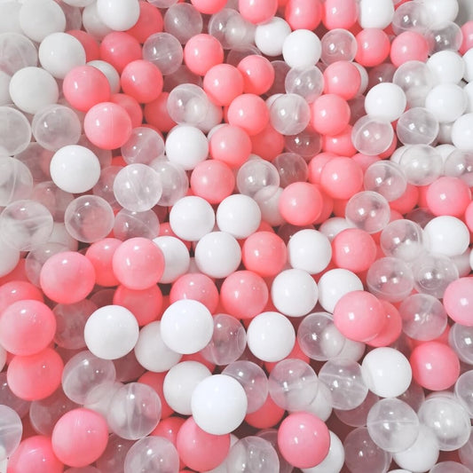 Kid in ball pit with Wonder Space balls, safe toddler play.