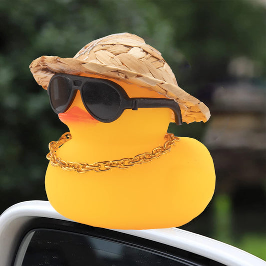 Wonuu car rubber duck wearing a gold necklace for a quirky decorative accent.