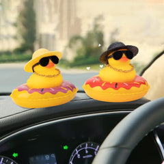 Wonuu car rubber duck package includes hat, sunglasses, necklace, and tape.