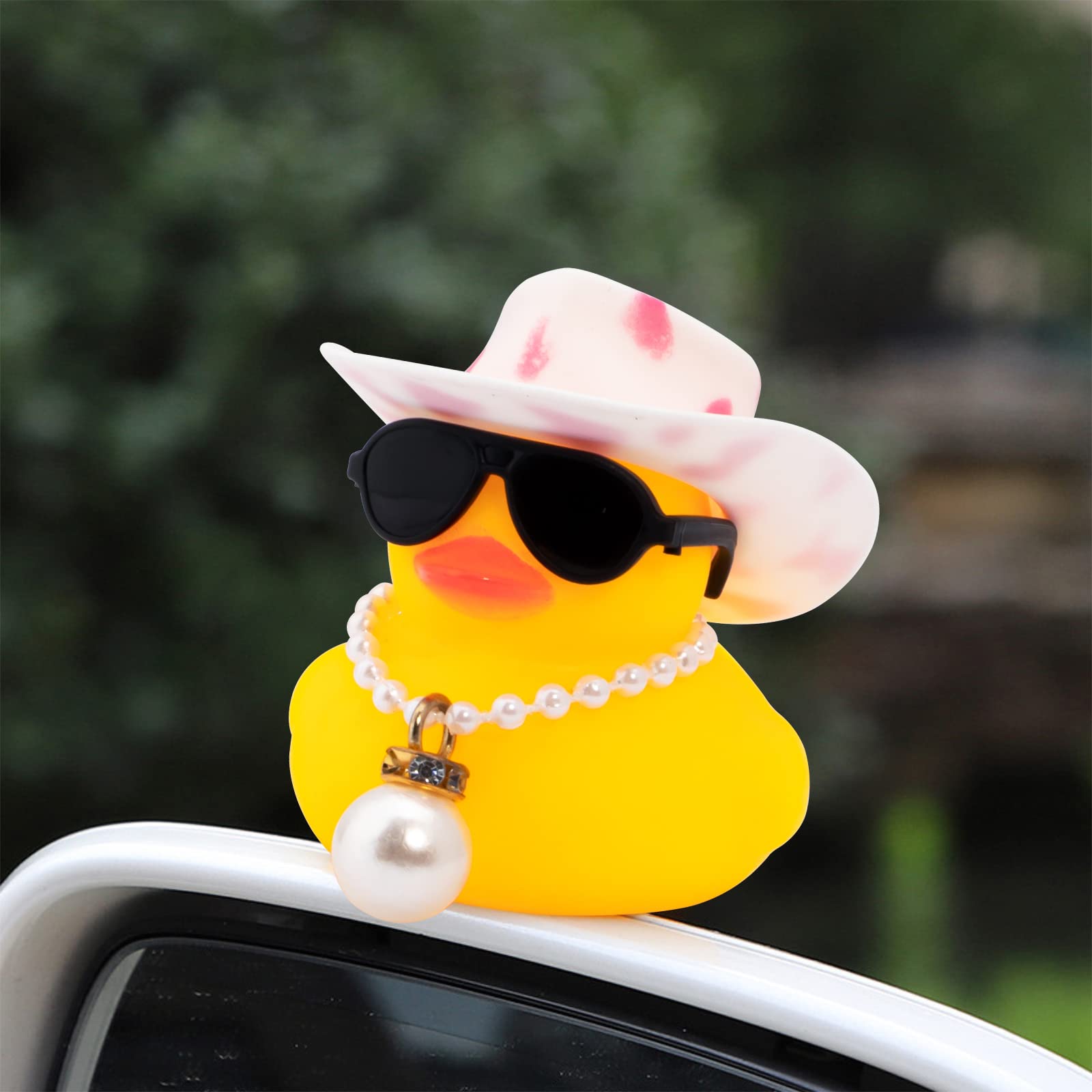 wonuu rubber duck with swim ring adds fun dash-side impact and conversation starter