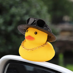 Wonuu car rubber duck with sunglasses enhances dashboard style.