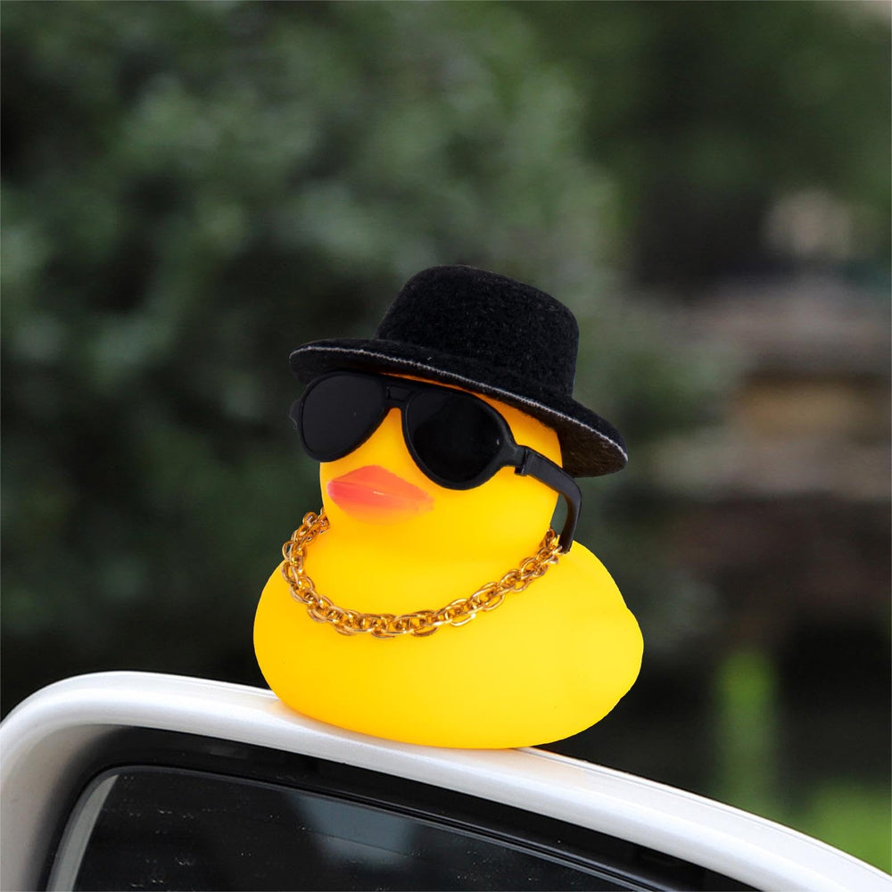wonuu dash duck with gold necklace and swim ring adds playful charm