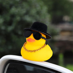 wonuu dash duck with gold necklace and swim ring adds playful charm