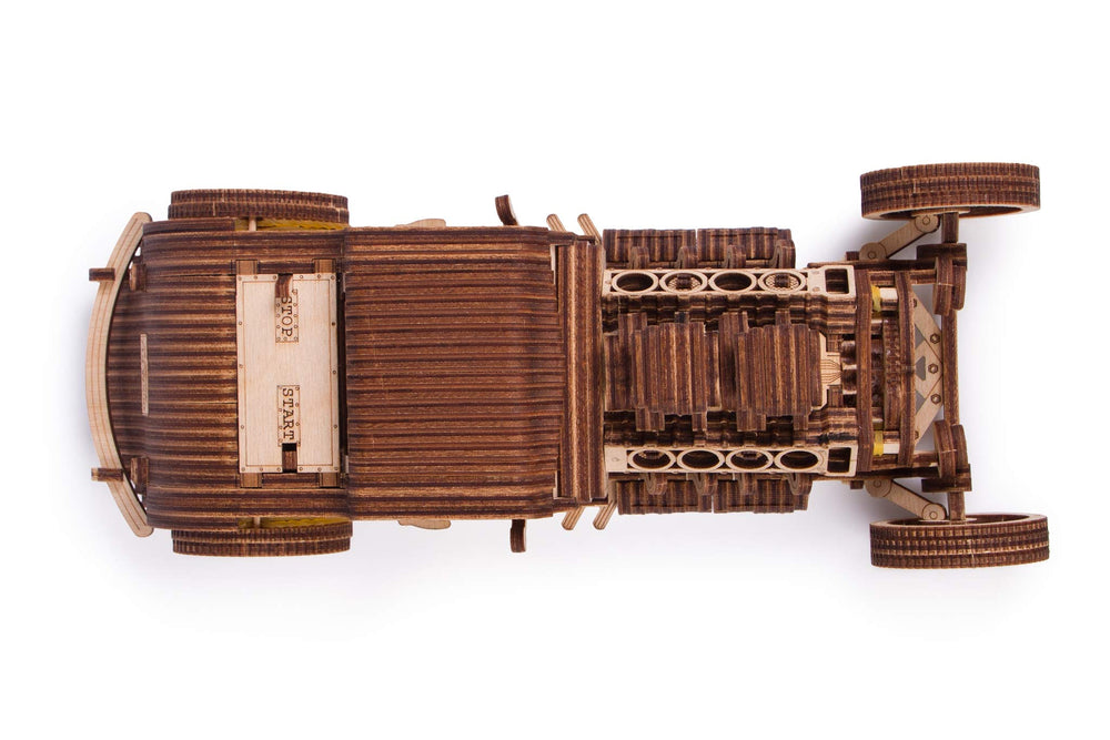 Progress shot of Wood Trick Hot Rod being assembled, encouraging focus