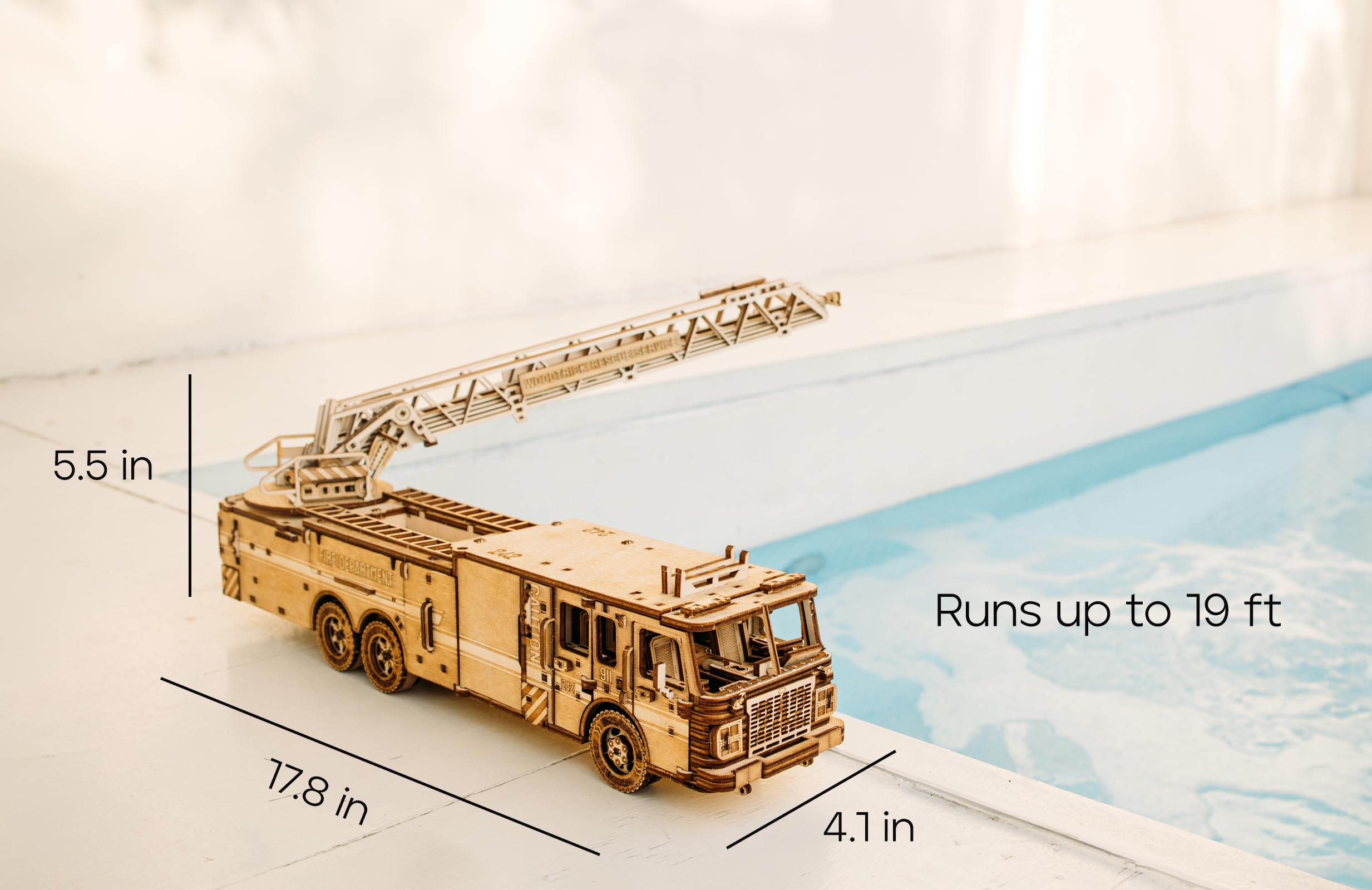 Wood Trick Rescue Firetruck ladder extend demonstrates extendable ladder for dynamic display.
