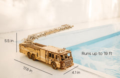 Wood Trick Rescue Firetruck ladder extend demonstrates extendable ladder for dynamic display.