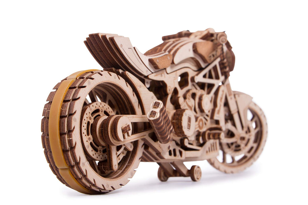 Wood Trick wooden model features gas pedal and brakes for an authentic assembly experience.