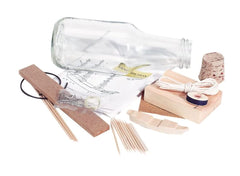 WOODKRAFTERS Pirate Ship in a Bottle kit shows step-by-step assembly for a challenging display