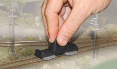 Woodland Scenics Tidy Track Rail Tracker Cleaning Kit soft bristles reach tight gaps.