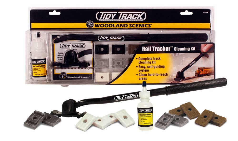 Woodland Scenics Tidy Track Rail Tracker Cleaning Kit spread on a workspace for convenient rail maintenance.