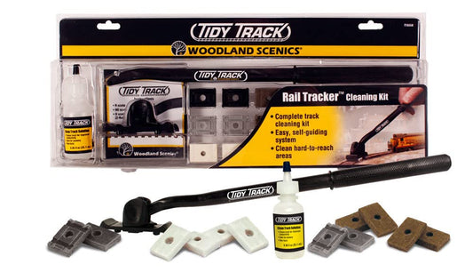 Woodland Scenics Tidy Track Rail Tracker Cleaning Kit spread on a workspace for convenient rail maintenance.