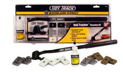 Woodland Scenics Tidy Track Rail Tracker Cleaning Kit spread on a workspace for convenient rail maintenance.