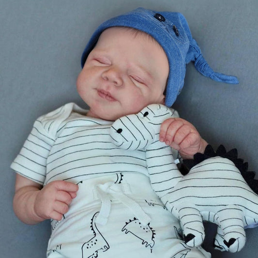 WOOROY realistic baby doll boy wearing a denim hat for display and gentle cuddling.