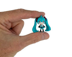 Compact display case keeps the micro figure safe while on display.
