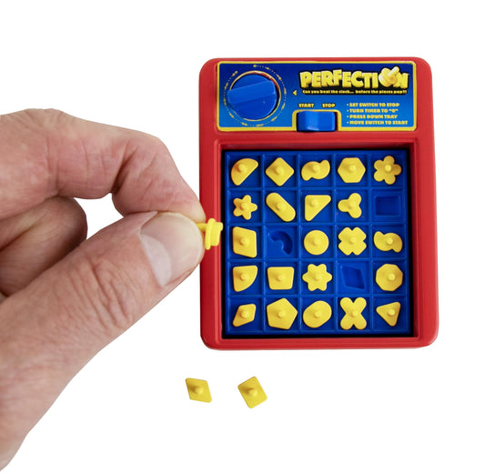 World's Smallest Perfection tray pop moment for quick, portable play on the go