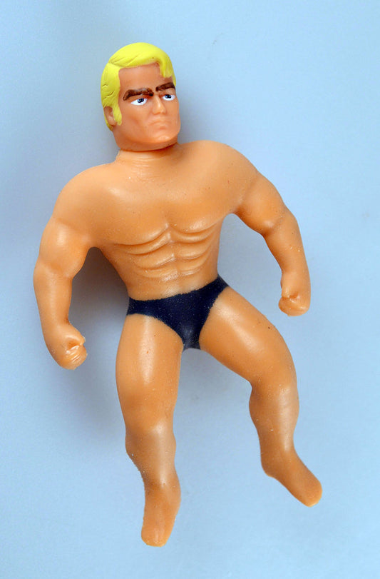 World's Smallest Stretch Armstrong demonstrates pull and twist action for tactile fun.