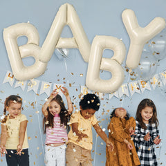 Wpensky large foil balloon R in cream adds a striking focal point to events.