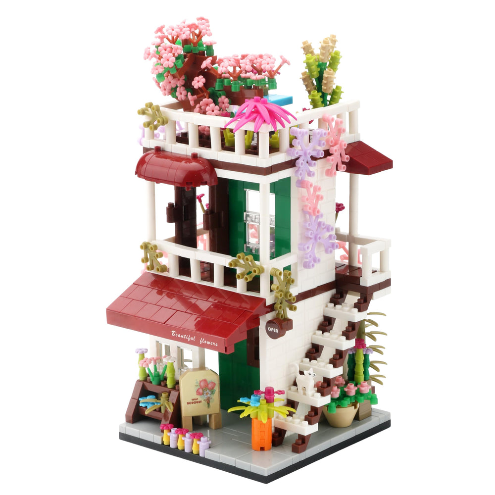 Wriyvngs Flower House exterior with vivid micro bricks on display shelf
