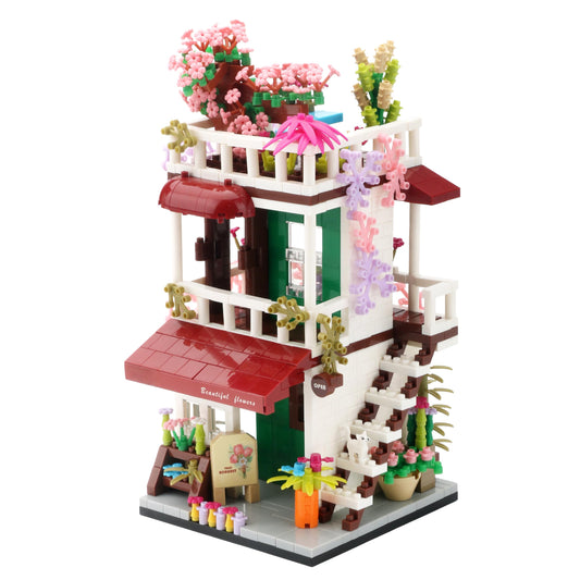 Wriyvngs Flower House exterior with vivid micro bricks on display shelf