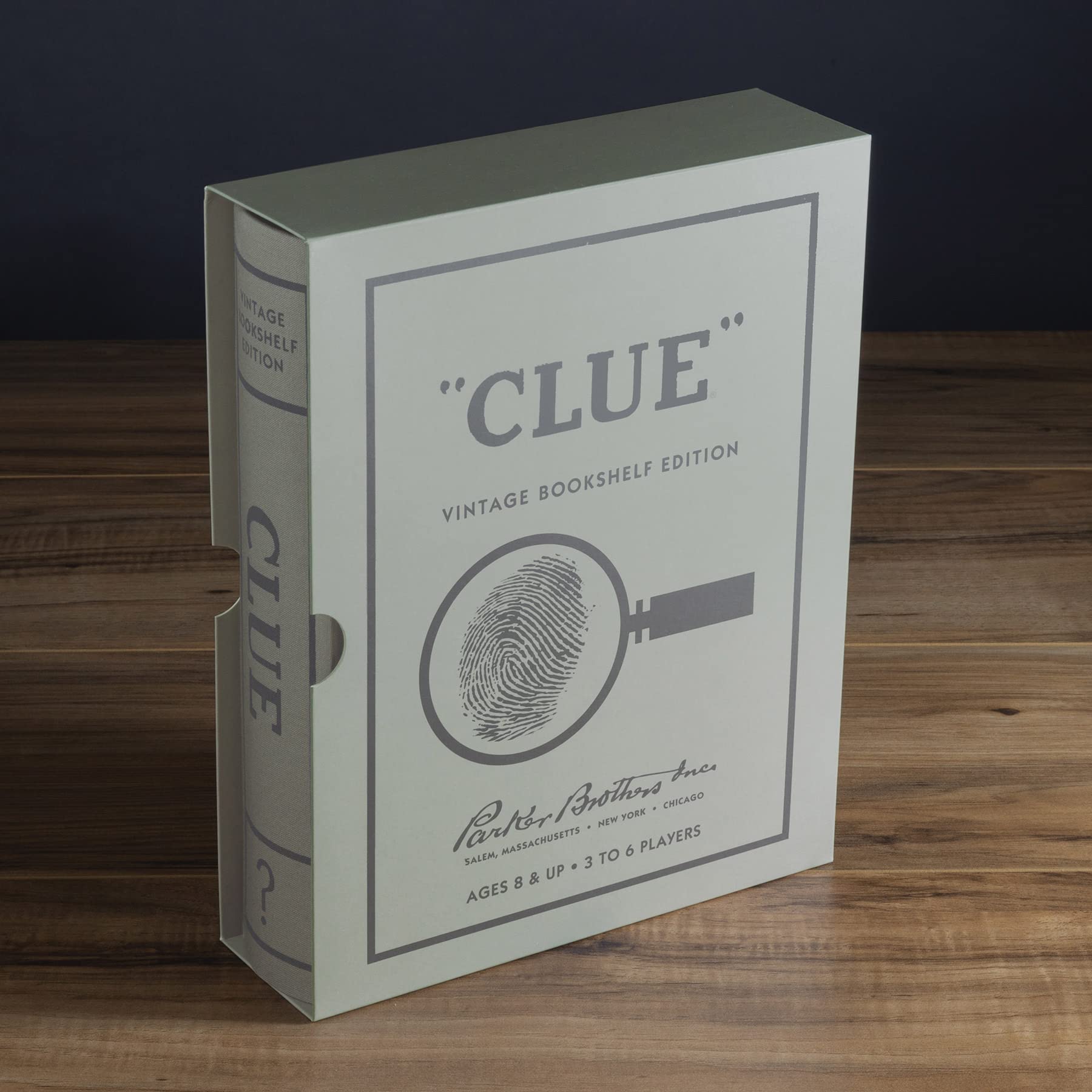 WS Game Company Clue vintage bookshelf edition display with elegant linen cover.