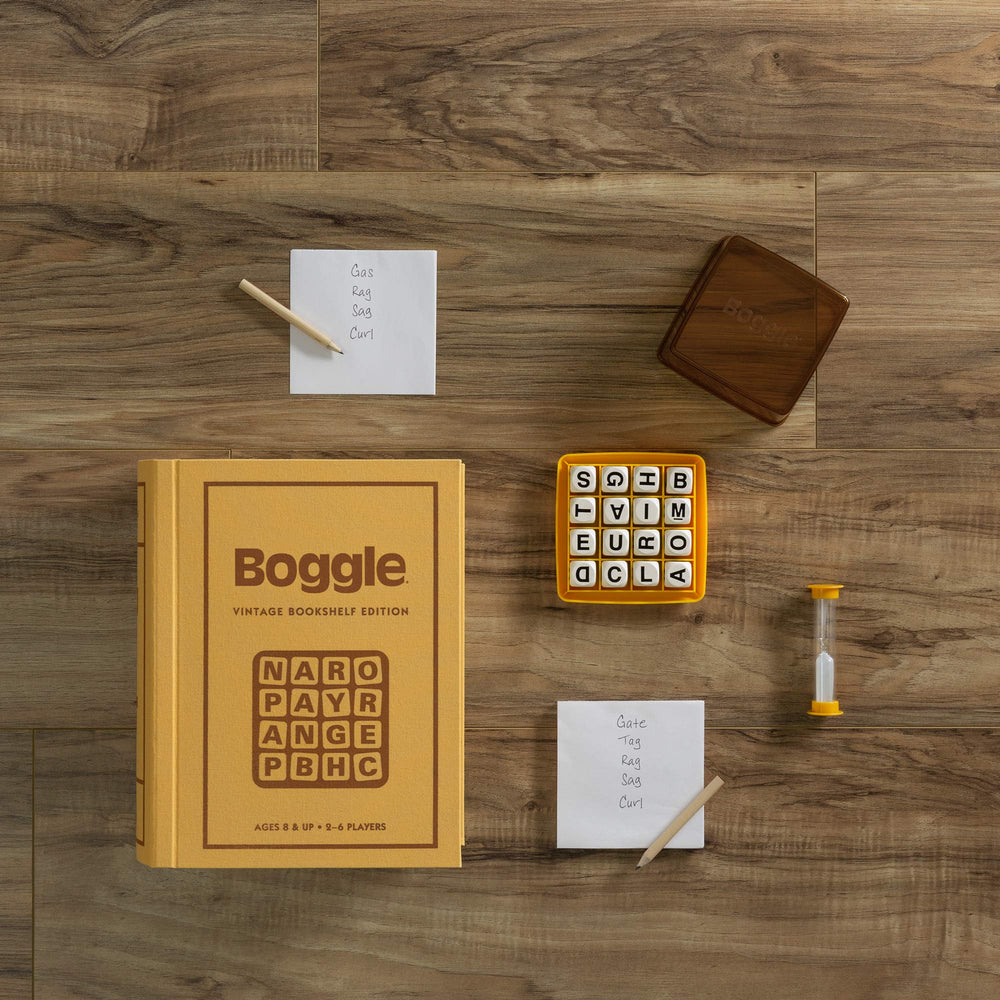 WS Game Company Boggle Vintage Bookshelf Edition 16-letter-cubes offer tactile, portable word challenges.