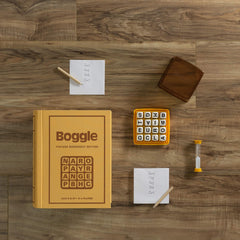 WS Game Company Boggle Vintage Bookshelf Edition 16-letter-cubes offer tactile, portable word challenges.