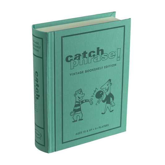 WS Game Company Catch Phrase Game in linen-wrapped book case for stylish storage