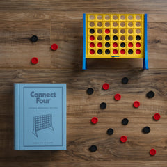 Connect Four vertical game board with sturdy end pieces supports easy setup.