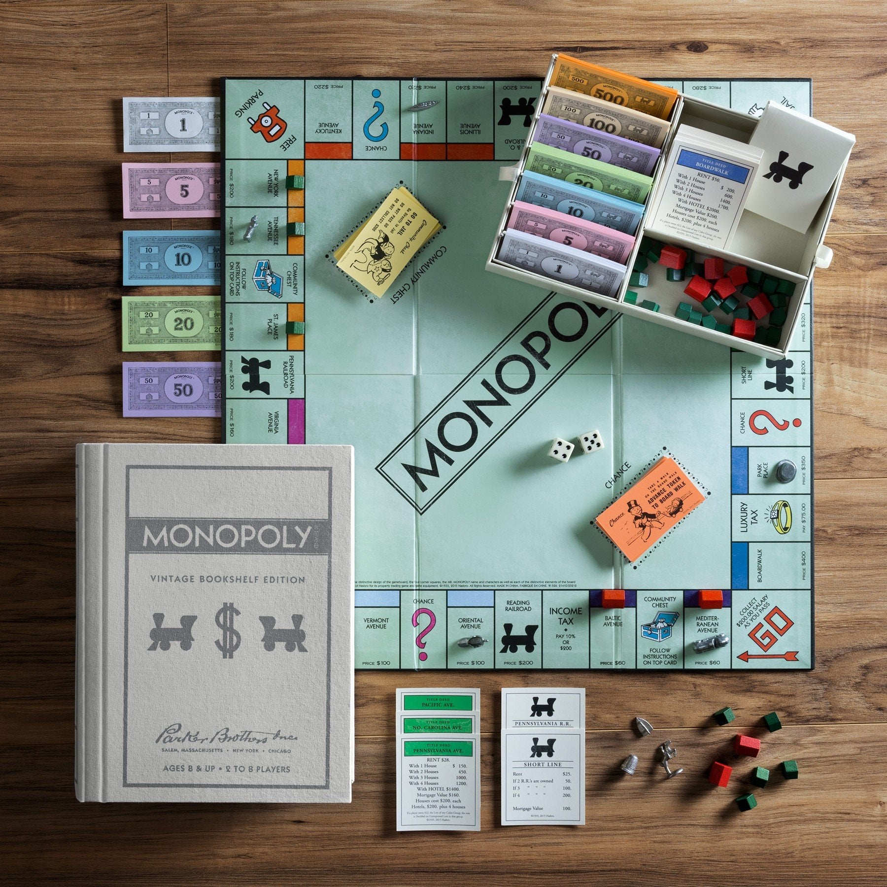 WS Game Company Clue pieces and board in a classic book-style case for nostalgic play.