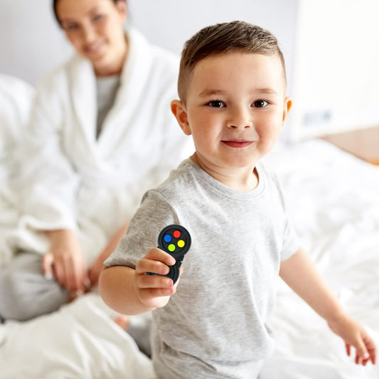 WTYCD toy showing the eight-function dials for tactile engagement.