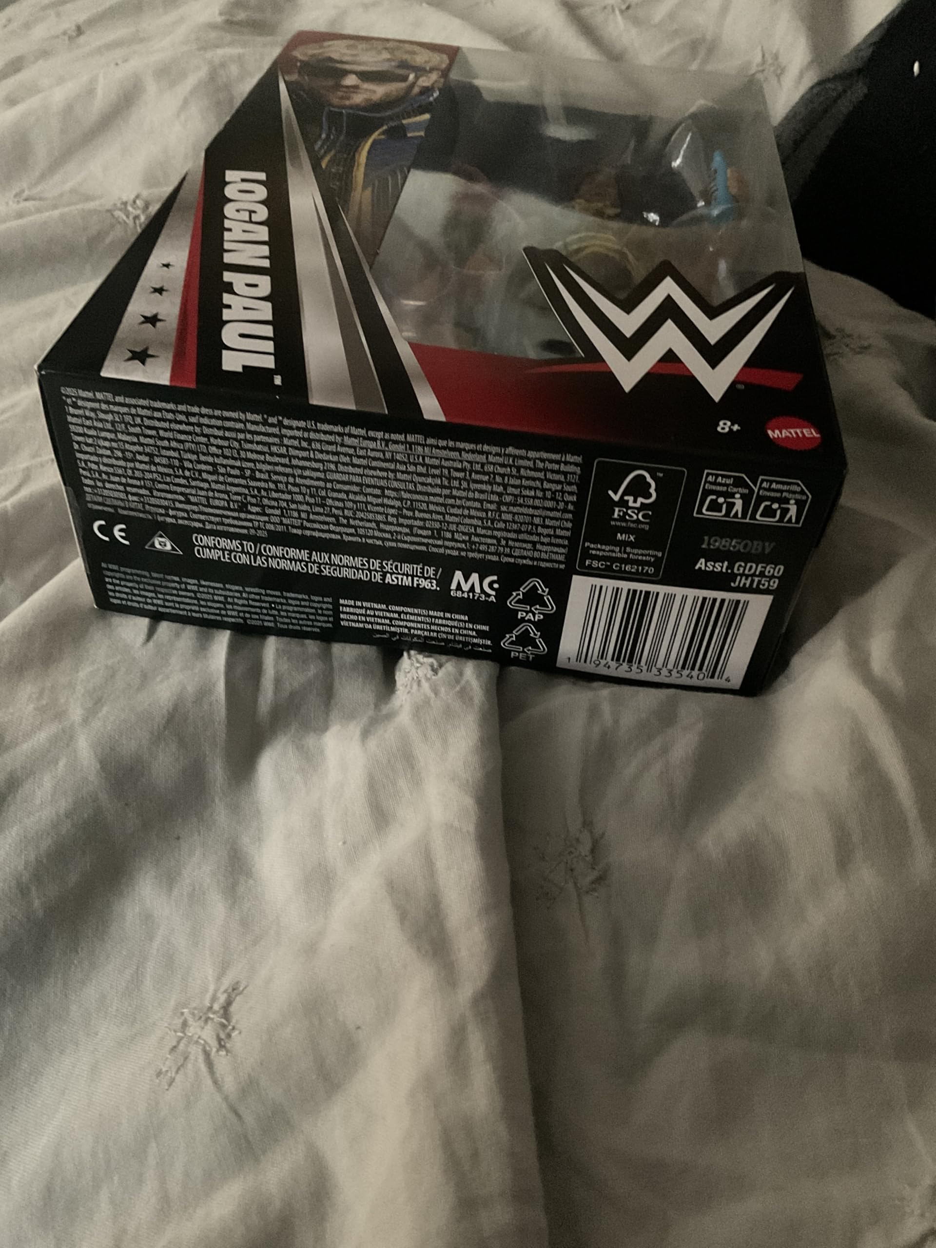 WWE Logan Paul Elite Greatest Hits 9 design details enhance collector appeal.