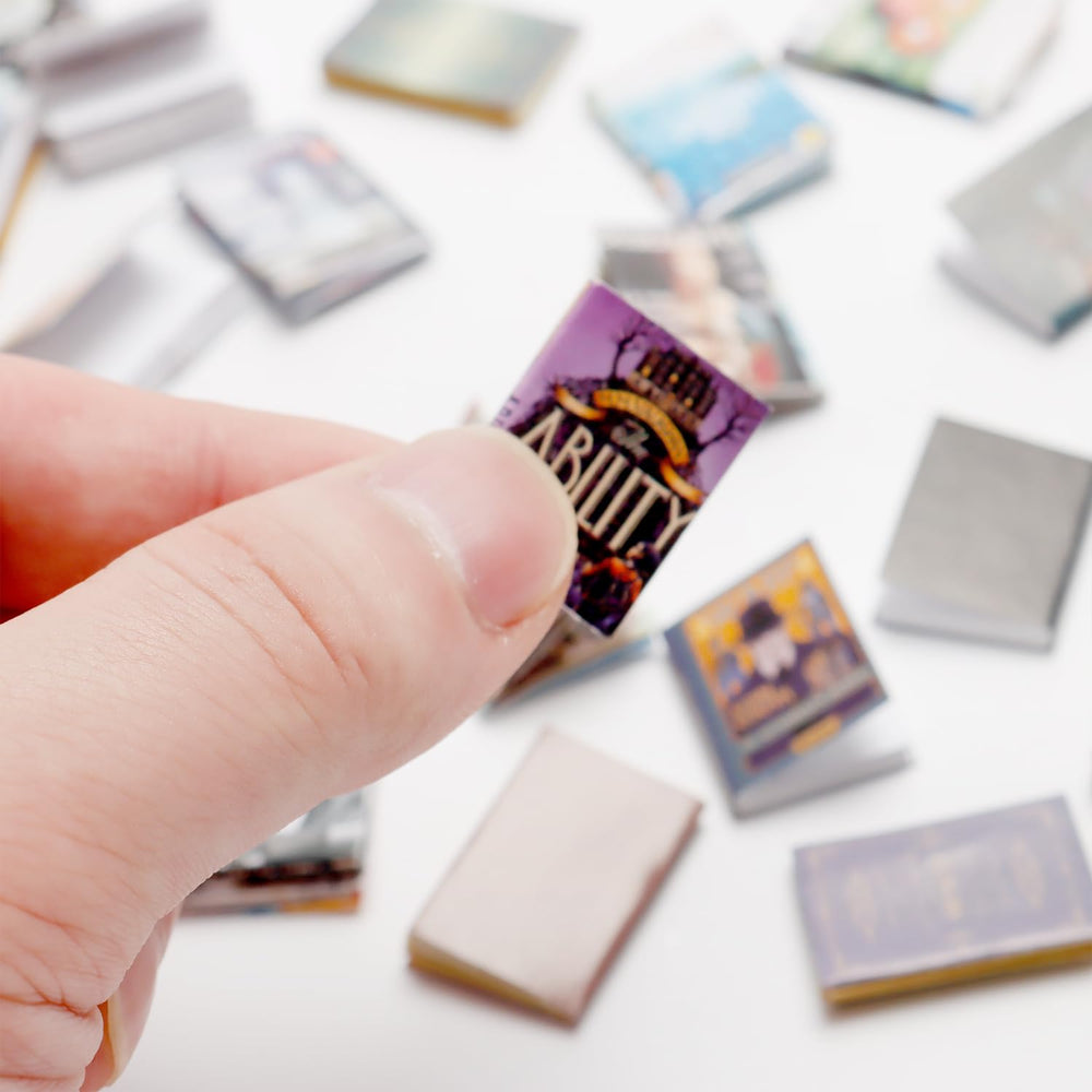 X Hot Popcorn mini books on a bedroom dresser for cozy vibes