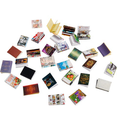 X Hot Popcorn mini books arranged on a shelf for elegant mini living room decor