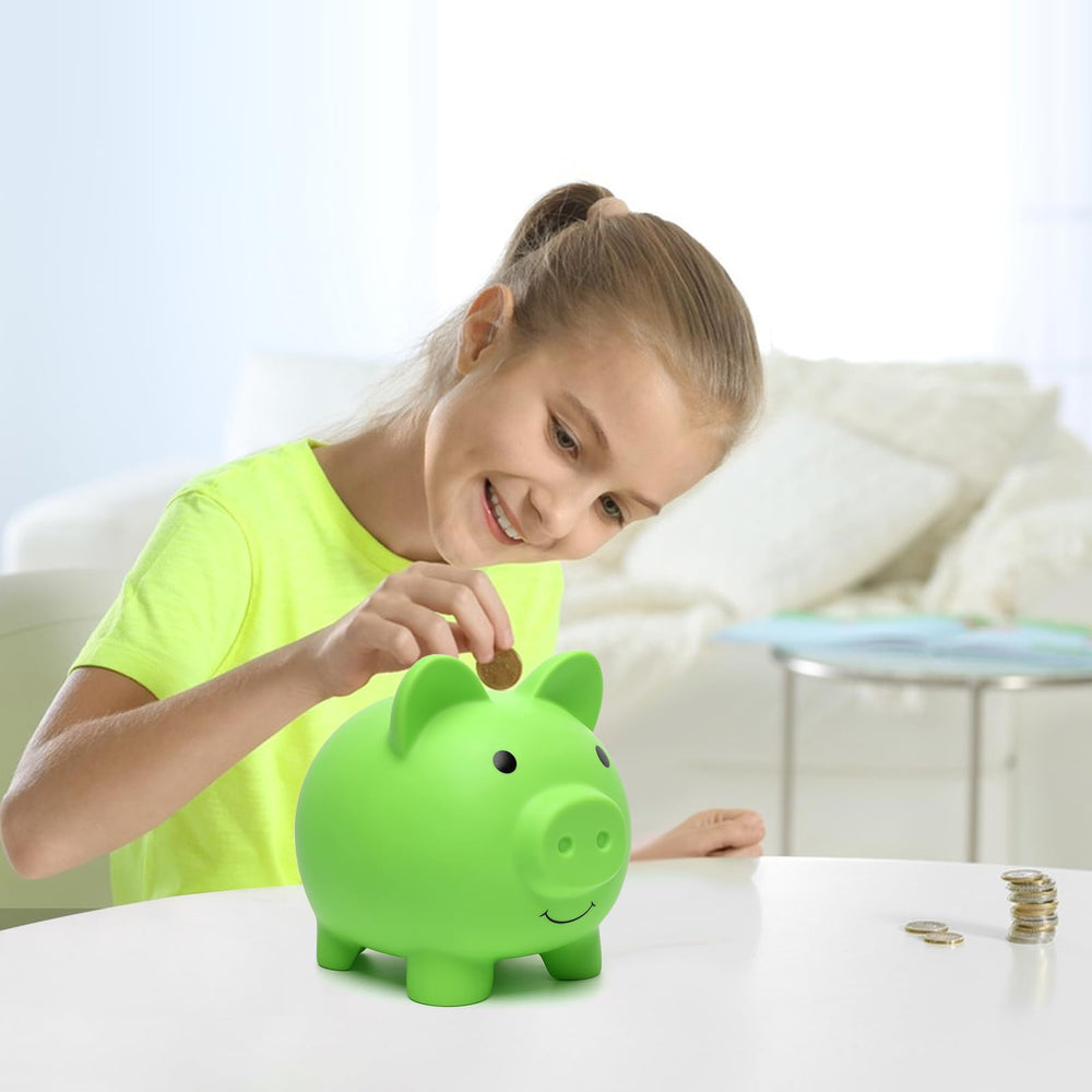 XDRELEC piggy bank green close-up plastic showing smooth edges