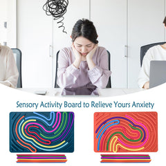 Xesakesi sensory activity board closeup highlighting tactile rings and loops for fine motor skills