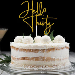 XIUHUBA Hello Thirty topper measures six inches wide and fits six-inch or larger cakes.