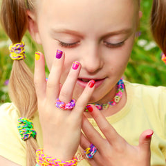 XKDOUS kids bracelet session shows active learning and hands-on creativity