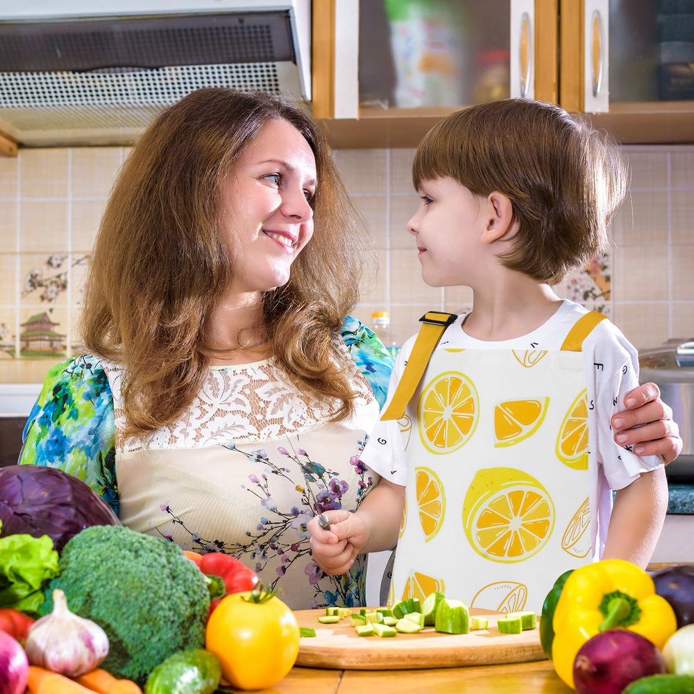 XLSXEXCL lemon kids apron in-use cooking highlighting mess-friendly design