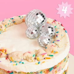 xo Fetti disco ball mini topper collection enhances desserts with sparkling shine