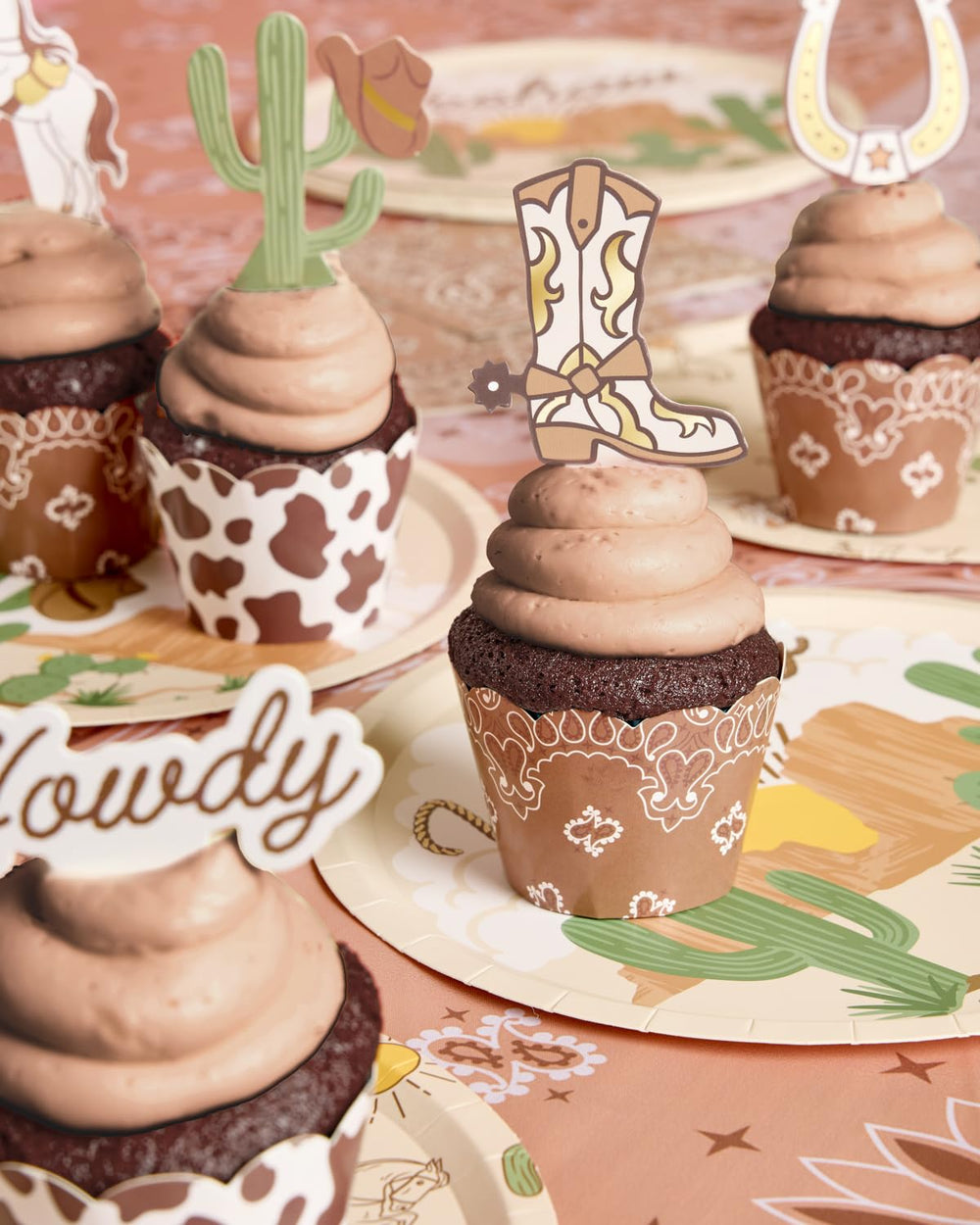 xo Fetti horse topper completes Western dessert scene