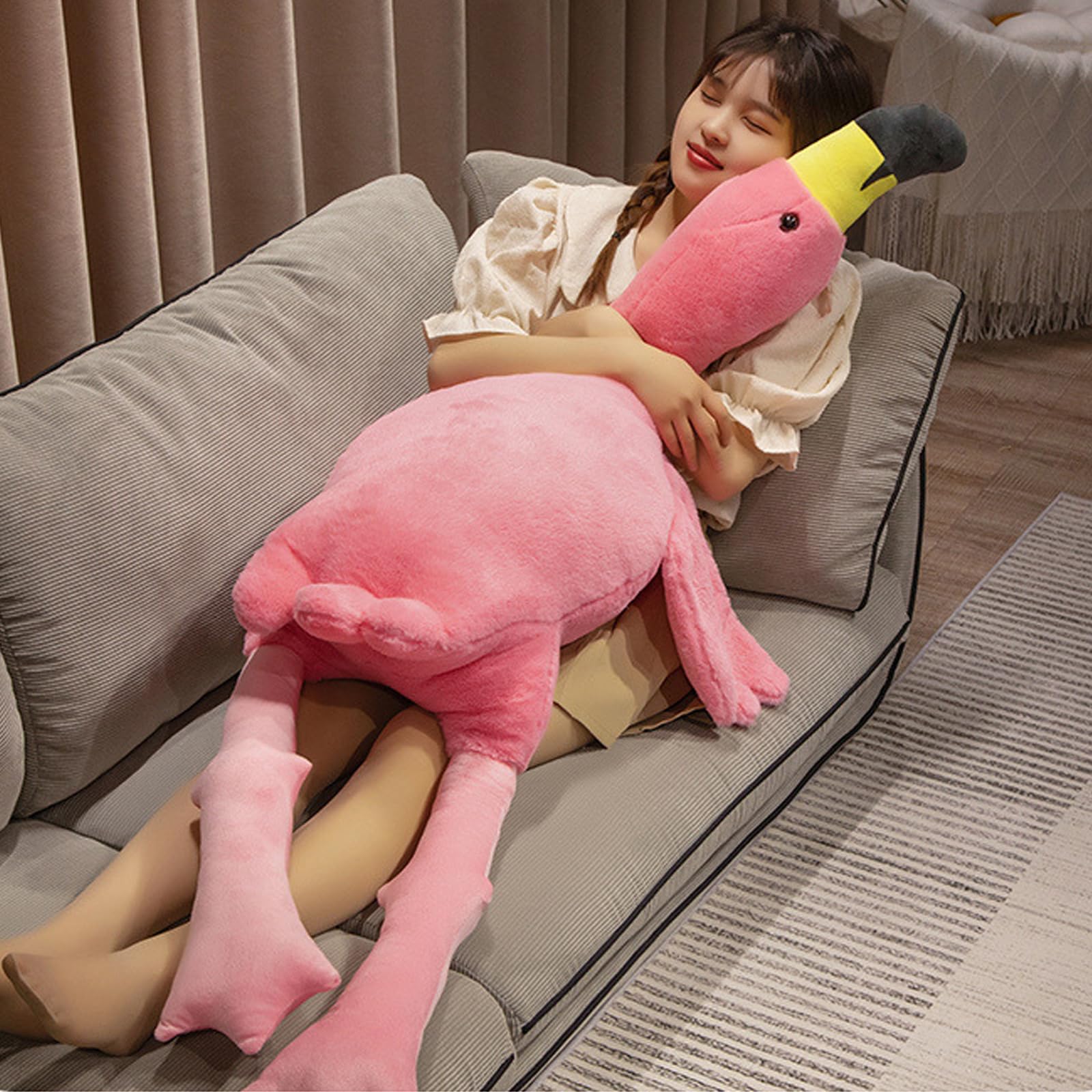XQEYNT flamingo pillow in a bedroom setup for bedtime comfort.