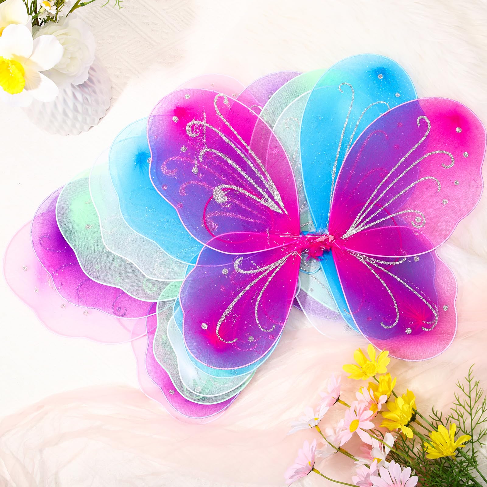 Xtinmee purple wings for kids, durable nylon with bendable frame.