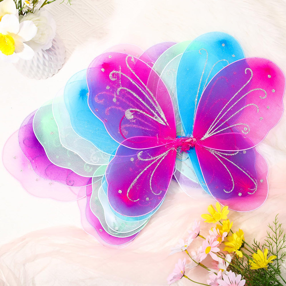Xtinmee purple wings for kids, durable nylon with bendable frame.