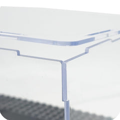 X XIN·SHI stackable display case keeps minifigures organized and accessible.