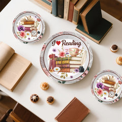 Xynic book-themed cake topper highlights the dessert centerpiece.
