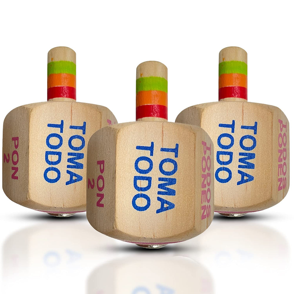 YAJUA Toma Todo Pirinola wood spinner close-up shows handcrafted detail for authentic guest entertainment