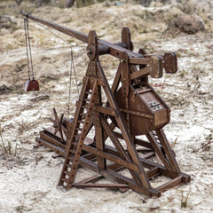 YAQUMW trebuchet side view showing compact tabletop design