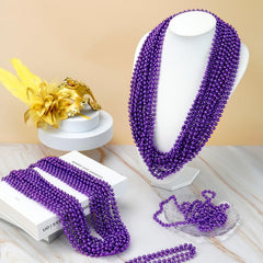 YAXINRUI purple Mardi Gras beads as party favors.
