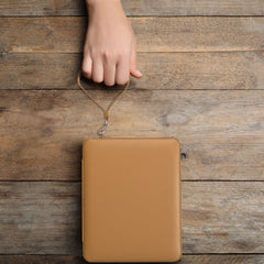 Yellow Mountain Imports travel backgammon mini zipper case secures all accessories.