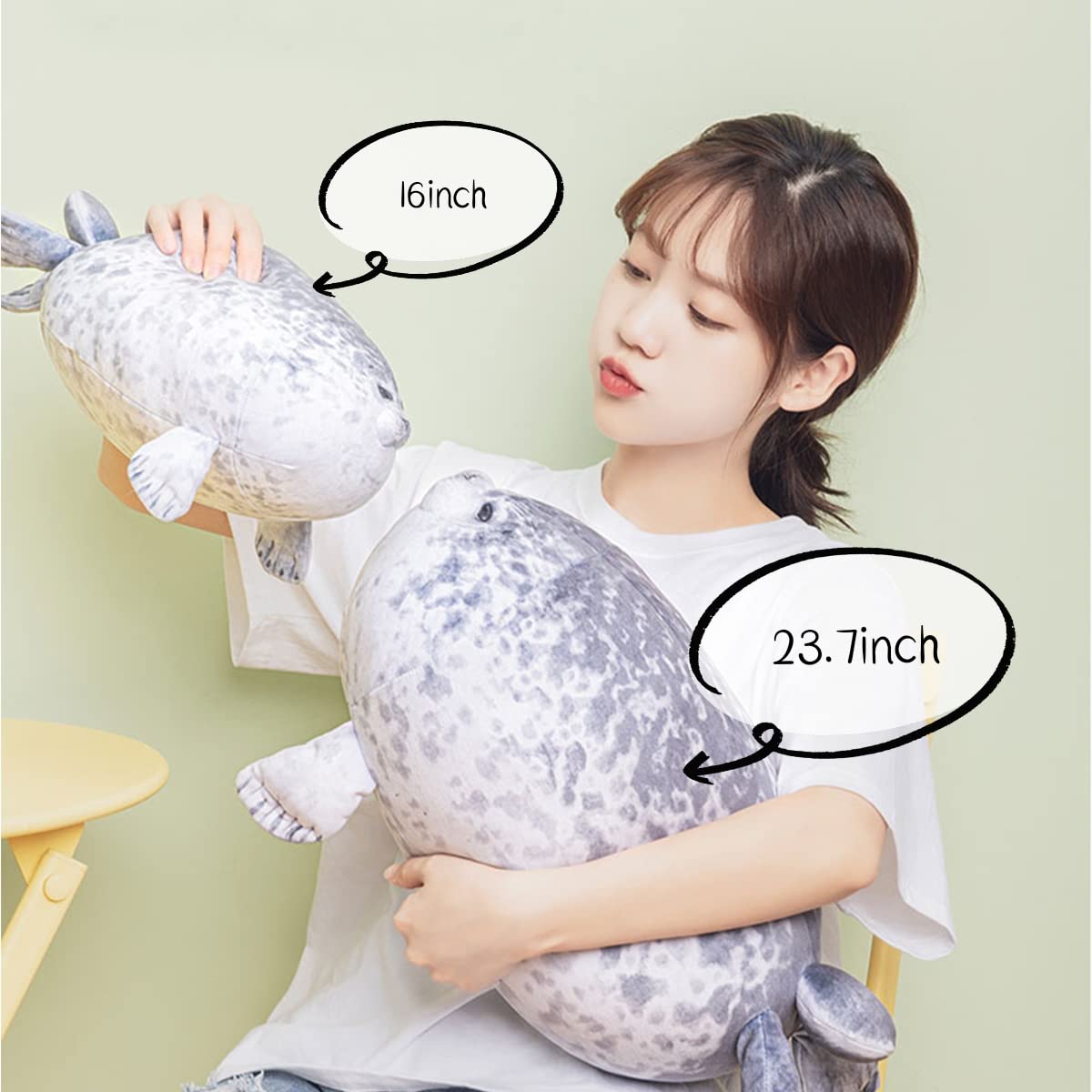 YesGIRL seal plush pillow close-up texture highlights ultra-soft material.
